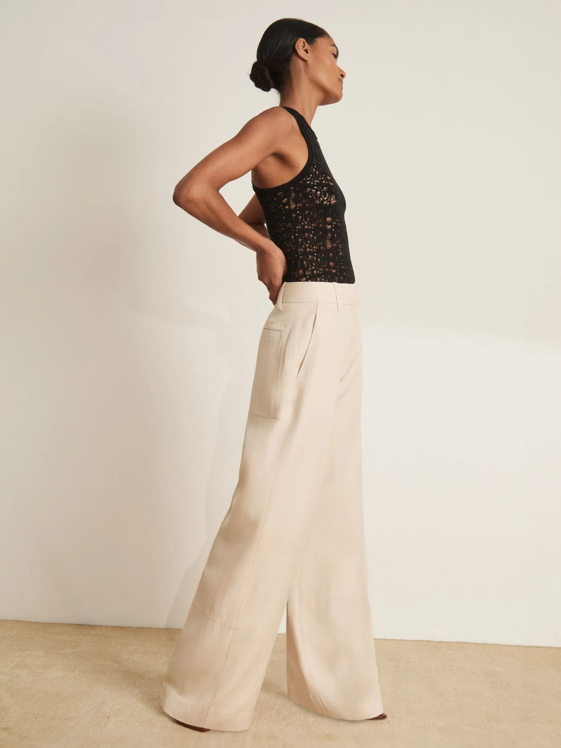 Atelier Ladder Knit High Neck Bodysuit in Black
