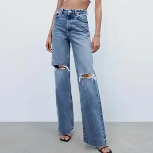 High-Waist Ripped Flare Denim Trousers