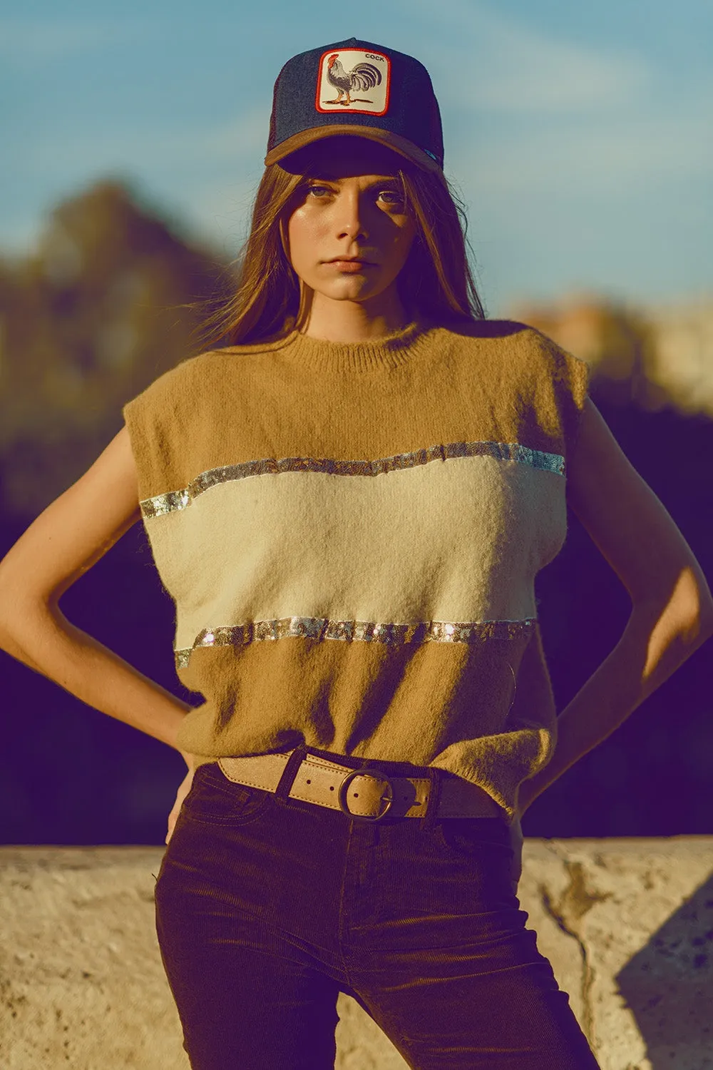 Sleeveless beige sweater with sequin detail